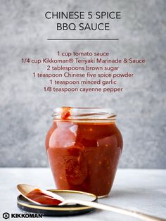 a jar of bbq sauce next to a spoon on a table with the recipe