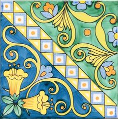 an artistic tile design in blue, yellow and green with flowers on the bottom corner