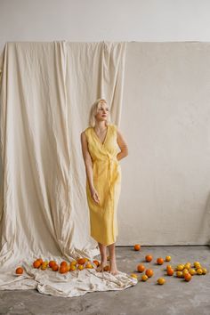 100% linen wrap dress for women. Vintage inspired, comfortable and easy going. A perfect dress for any occasion: from having a picnic in the park to attending a ceremony. Available in sunshine yellow and forest green.   <> Ugnė is 180cm/5'9" and wearing size S in Sunshine Yellow Elžbieta is 165cm/ 5'4" and wearing size S in Forest Green Details: - This listing is for linen dress Salomėja - Made using 100% OEKO Tex 100 certified Baltic linen - Medium weight linen (185g/m2 or 5,45oz/yd2) - 2 pocke Summer Wrap Linen Maxi Dress, Summer Linen Wrap Maxi Dress, Spring Linen Wrap Maxi Dress, Lightweight Linen Wrap Dress For Spring, Summer Linen V-neck Wrap Dress, Linen Wrap Dress, Sleeveless Wrap Dress, Kids Garments, Green Details