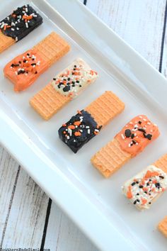 easy halloween sugar waffles with sprinkles on them and text overlay that says easy halloween sugar wafers