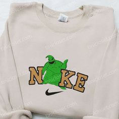 Oogie Boogie x Nike Movie Embroidered Shirt, Nike Inspired Embroidered Shirt, Best Halloween Gift Ideas Nike Cartoon, Horror Hoodie, Baby Dumbo, Embroidered Shirts, Mike Wazowski, Limited Edition Shirt, Custom Nike, Cartoon Sweatshirts, Oogie Boogie