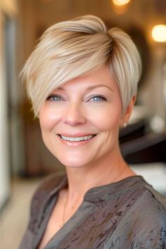 Layered Pixie with Side-Swept Bangs Haircut on smiling woman over 50 with blonde hair. Swept Bangs, Side Swept Bangs