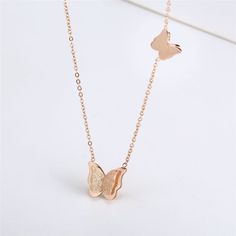 Accessorize to the nines with this eye-catching pendant necklace sporting a warm, rose gold plated finish for luxe appeal. Chain: 15.75" L with 1.96" extender Pendant: 0.43" W x 0.43" H Lobster claw clasp 18k rose gold-plated titanium steel Rose Gold Clavicle Chain Necklace For Mother's Day, Rose Gold Stainless Steel Clavicle Chain Charm Necklace, Rose Gold Stainless Steel Clavicle Charm Necklace, Rose Gold Stainless Steel Clavicle Chain Necklace, Mother's Day Rose Gold Clavicle Chain Necklace, Rose Gold Stainless Steel Charm Necklaces For Mother's Day, Minimalist Rose Gold Metal Charm Necklaces, Rose Gold Charm Necklace For Valentine's Day Party, Rose Gold Stainless Steel Pendant Necklace