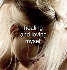 a woman with her hair pulled back and the words, healing and loving myself