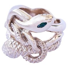 Animal Jewelry Emerald Marquis White Diamond Ruby Snake Ring Cocktail Ring Bronze J Dauphin Style: Cocktail Ring Material: Polished Bronze Designer: J Dauphin J DAUPHIN "Eternal Renewal" J Dauphin jewelry is hand made in Los Angeles and was created by designer Johanna Dauphin. Most of the jewelry is unique or created in small series. Every gem is individually selected by hand. She started her career working for the Italian luxury brand Fendi, now owned by the Louis Vuitton Group LVMH. J Dauphin Lykke Li, Chloë Sevigny, Jewelry Emerald, Sapphire Cocktail Ring, Chloe Sevigny, Italian Luxury Brands, Uma Thurman, Snake Jewelry, Gold Cocktail