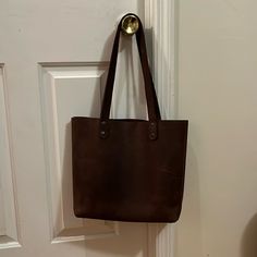 Handmade Leather Tote Bag Features An Interior Zipper Pocket. Reinforced Bottom And Twin Handles For Better Durability. Simple, Elegant, And Easy To Carry. Beautiful Brown Leather Bag Perfect For Travel Or Everyday Use. Fits A Laptop Perfectly, Or Whatever You Need For A Day Trip. Worn A Few Times; The Scratches Shown Are Typical For This Type Of Material (Most Were Present When Purchased). It’s So Well-Made And The Color Is Gorgeous, It Just Doesn’t Really Match My Style, So I’d Love To See It Go To Someone Who Will Wear It Well! Handmade Leather Tote Bag, Handmade Leather Tote, Mr Fox, Leather Artisan, Brown Leather Bag, Simple Elegant, Mexico City, Handmade Leather, Leather Tote Bag