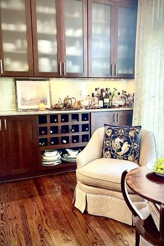 a living room filled with furniture and wooden floors