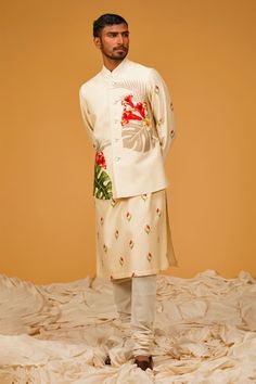 Ivory bundi with tropical print all over. Paired with printed kurta and churidar. - Aza Fashions Spring White Nehru Jacket With Floral Print, Traditional White Nehru Jacket For Summer, Festive White Nehru Jacket With Floral Print, Kurta Set Men, Rohit Bal, Nehru Jacket, Churidar, Kurta Set, Bird Prints