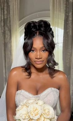 a woman in a wedding dress holding a bouquet