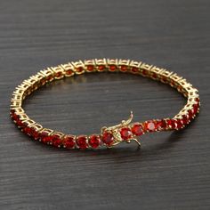 Brand New Women's Gold Ruby Tennis Bracelet Available In 7" & 8" Sizes (7" Is The Most Common Women's Size) Width 4mm 14k Gold Plated Sterling Silver Genuine 2ct Natural Red Ruby Gemstones Retail Price $400 Buy With Confidence From A Top Rated Seller With A 99%+ Rating! A1184 (Id-651) Red Luxury Tennis Bracelet For Formal Occasions, Luxury Red Diamond Bracelet For Anniversary, Luxury Red Tennis Bracelet For Anniversary, Classic Ruby Gemstone Tennis Bracelet, Luxury Red Diamond Jubilee Bracelet, Gemstone Accented Fine Jewelry Tennis Bracelet, Luxury Red Ruby Tennis Bracelet, Luxury Red Tennis Bracelet, Red Luxury Jubilee Tennis Bracelet