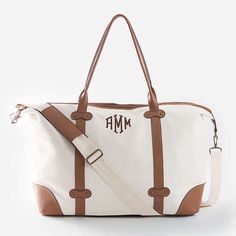 This vintage style weekender is ready to tag along with you for all your trips! Perfect for any woman on the go, this beautiful weekend bag features antique gold hardware. Add a monogram and pair it with a monogrammed tote bag, monogrammed cosmetic bag or any other piece from our Vintage Travel Collection for a great gift that any bride, college student or globe trotter will love.Zipper top closure Body made of durable cotton canvas with a faux leather trim and a tan brushed polyester liningFeat Monogram Cosmetic Bag, Canvas Weekender Bag, Beautiful Weekend, Marley Lilly, Weekend Bag, Trotter, Travel Collection, Vintage Canvas, Zipper Top