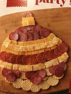 the cover of party's magazine features an image of a platter of meat and cheese