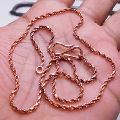 Total Weight: 8 grams Total Weight: 7 grams  Flat Cable Chain -5MM Metal : Copper Necklace Thickness of the  Rope chain 2 mm & 3MM 100% Pure Copper Chain Necklace Copper Chain Necklace Length ,16,18,20,22,24 inches The necklaces made of copper are made by me in my home factory. Unique and handcrafted, picture of the original item. Makes a Wonderful Gift for your Girlfriend, Wife, Mom or Simply an Excellent Addition to Your Jewelry Collection. As a metal, Copper  has significant health benefits that have been used across cultures for centuries. Copper has a proven track record as a powerful antimicrobial agent fighting infections and aiding in cold and flu prevention, wound healing, and more. Copper also helps with internal heat regulation and circulation. We accept custom and personalized Gold Copper Chain Necklace As Gift, Gold Copper Chain Necklace For Gift, Handmade Copper Jewelry, Copper Chain Necklace, Copper Jewelry Handmade, Chain Diamond, Rope Chain Necklace, Necklace Chain Lengths, Copper Necklace