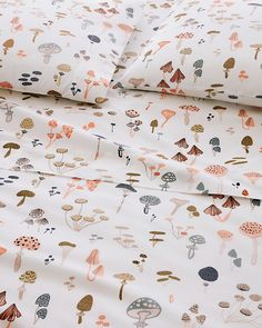 an image of a sheet set with mushrooms on it in pink and orange colors,