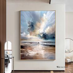 a large painting hanging on the wall above a wooden floor in a room with white walls