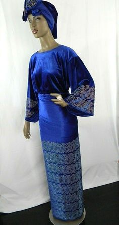 "Velvet With Stones Design/Nigerian Party Outfits/Trendy African Velvet Outfits/Ready Made Velvet 3 Piece Set Wrapper, Buba & Gele/Royal Blue Measured While Laying Flat: Size: L/56 Armpit to Armpit: 23.5\" (Full Chest: 47\") Shoulder To Bottom: 24.5\" Sleeve Length From Neckline: 22\" Wrapper: Wide: 68; Length: 49\" ~~Gele: L/56\" & W/18\" Size: XL/58 Armpit To Armpit: 24\" (Full Chest: 48\") Shoulder To Bottom: 25\" Sleeve Length: 22.5\" Wrapper: Wide: 70\"; Length: 50\" ~~ Gele: L/56\" Formal Blue Long Sleeve Agbada, Elegant Blue Long Sleeve Agbada, Festive Fitted Traditional Agbada, Elegant Blue Agbada For Festive Occasions, Blue Traditional Formal Agbada, Traditional Festive Agbada For Party, Elegant Blue Agbada For Wedding, Festive Traditional Agbada For Parties, Blue Traditional Agbada For Party