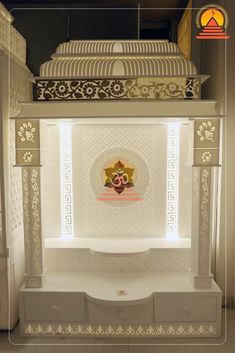 an elaborately designed display case with decorative designs on the front and back sides, in white