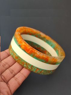 "you will receive 1 piece of Handmade resin bangle Bracelet Colorful Resin Stacking Bracelet  Modern Trendy jewelry Gift For Women Inner diameter= 2.6\" approx. Material: Resin Quantity: 1 Piece Thank you very much for visiting! Any questions, please feel free to contact us. Discount for bulk provide." Handmade Retro Bracelets As Gift, Handmade Orange Cuff Bracelet Bangle, Handmade Orange Bangle Cuff Bracelet, Handmade Orange Cuff Bangle, Retro Handmade Bangle Jewelry, Orange Bohemian Bangle As A Gift, Bohemian Orange Bangle For Gifting, Orange Bohemian Bangle As Gift, Adjustable Resin Bangle