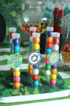 there are many candy tubes on the table