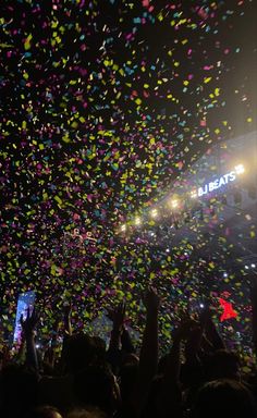 confetti is thrown in the air at a concert