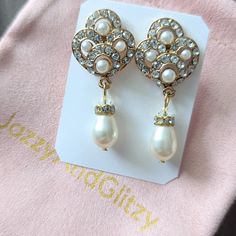 Indulge in sophisticated elegance with our Vintage style drop pearl earrings. These Downton Abbey-themed earrings feature Swarovski pearls and crystals, adding a tasteful touch of glamor to any outfit. Measuring 1.5" long, they exude grace and style. Perfect for weddings or special occasions. Elegant Clip-on Crystal Earrings, Elegant Pearl White Crystal Pearl Earrings, Elegant Crystal Drop Pearl Earrings, Elegant Pearl Crystal Drop Earrings, Elegant Crystal Dangle Clip-on Earrings, Formal Dangle Crystal Earrings With Pearls, Formal Dangle Crystal Pearl Earrings, Formal Pearl Dangle Crystal Earrings, Glamorous Pearl Drop Crystal Earrings