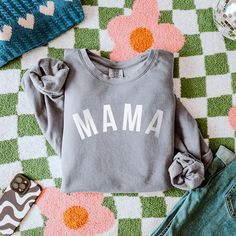 She's Baaaaaack! Our Modern Mama tee, hoodie or crewneck now has a permanent place in the shop! This is the PERFECT design for gifting, an easy basic for travel, or the perfect crewneck to throw on and head out! Annnnd include the entire family! This modern style is available for dad, mini, or big/little bro or sis! Perfect for ANY family! We're thinking year family pics, baby announcements, or just a cute matching moment! DETAILS Unisex sizing - aka mens sizing. This fits a little more relaxed than our regular crewnecks and tees. 80/20 ring spun cotton/polyester, 3-end garment-dyed soft ring spun color blast fleece with a 100% cotton face Relaxed fit with a rib collar, twill taped back neck, rolled forward shoulder & side seams Available on Black, Espresso, Ivory or Grey comfort colors te Cotton Hoodie With Screen Print Crew Neck, Cotton Graphic Tee Sweatshirt For Everyday, Unisex Cotton Sweatshirt With Letter Print, Unisex Letter Print Cotton Sweatshirt, Comfortable Cotton Sweatshirt With Screen Print, Comfort Gray, Baby Announcements, Mama Tee, Family Pics