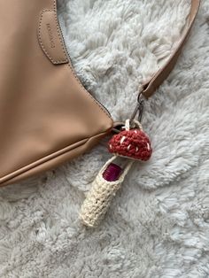 Crochet mushroom lip balm holderkeychain Crochet Charm Bag, Crochet Mushroom Lip Balm Holder, Crochet Lipstick Holder, Bag Charms Crochet, Mushroom Lip Balm Holder, Mushroom Lipstick, Chapstick Holder Crochet, Crochet Bag Accessories, Crochet Jewelry Holder