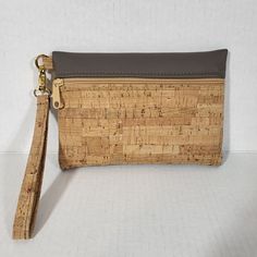 Natalie Therese Handbag Wristlet Handmade Eco-Friendly Tan Cork Zip Closure USA width 7.5" height 5.5" Adjustable Rectangular Wristlet For Mobile Phone, Adjustable Rectangular Wristlet Mobile Phone Bag, Rectangular Wristlet With Adjustable Strap, Adjustable Wrist Strap Rectangular Clutch, Gift Wristlet Clutch With Adjustable Strap, Gift Clutch Wristlet With Adjustable Strap, Daily Use Rectangular Wristlet With Adjustable Strap, Rectangular Wristlet With Adjustable Strap For Daily Use, Adjustable Rectangular Wristlet With Zipper Pouch