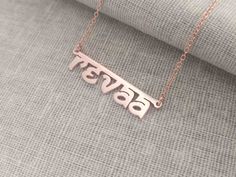 "Personalized Hindi Name Necklace Rose Gold Plated over 925 Sterling Silver - A special gift for you and your loved ones,They would be very surprise to see their name made it just for them. The gold name necklace can be personalized with any name. All of my products are handmade. Why buy from us? Quality Product At Affordable Prices 1.2mm Super Thickness. 100% Satisfaction Guaranteed. Detail Material:925 sterling sliver, Thickness:1.2mm(0.05\") Chain Length:14\",16\",18\",20\",22\" Width: 25mm-3 Traditional Name Necklace As Gift, Rose Gold Jewelry For Festivals Gift, Rose Gold Jewelry For Festivals And Gifts, Festive Rose Gold Jewelry Gift, Traditional Silver Engraved Name Necklace, Traditional Engraved Silver Name Necklace, Traditional Engraved Name Necklace For Wedding, Spiritual Necklaces For Navratri Gift, Traditional Wedding Name Necklace, Engraved