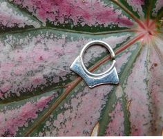 Geometric silver hoop ring- tribal boho piercing ~ Can be used as a nose ring / septum / tragus / single earring / helix / lip ring ~ Size of the nose ring: Inner diameter : 1/4, 5/16 or 3/8 inch (7,8 or 9 mm) Wire gauge : 24,22,20,18 or 16 (0.5, 0.6, 0.8, 1 or 1.2 mm) ~ For larger sizes and special requests please contact me through the' Request custom order' bar. ~To open the ring -gently twist the ends sideways, slip into the hole and then gently twist the ends back for a continuous hoop. ~ Y Bohemian Hoop Septum Ring As Gift, Bohemian Silver Belly Rings Nickel Free, Handmade Silver Small Hoop Nose Ring, Bohemian Silver Nose Rings Nickel Free, Nickel-free Silver Bohemian Septum Ring, Handmade Minimalist Sterling Silver Septum Ring, Bohemian Sterling Silver Nose Rings, Bohemian Silver Nickel-free Septum Ring, Bohemian Sterling Silver Septum Ring As Gift