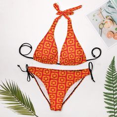 • Retro Bikini Set: Embrace a vintage vibe with this stylish halter bikini set featuring a mod 60s floral-inspired pattern print in vibrant red and orange.• Vintage Style Bikini: Designed with a nostalgic touch, this bikini set captures the essence of 60s and 70s fashion, perfect for a boho summer look.• Mod Orange Bikini: The bikini top is lined for comfort and support, featuring a cute floral pattern. The matching bikini bottom has string ties for an adjustable fit.• Floral Bikini: Made from 86% polyester and 14% spandex, this bikini offers a comfortable, stretchy fit. Its eye-catching floral print makes it a sexy and cute choice for summer fun.•Designed in California by Trendy Hip Buys. Made to order from overseas.Care: Hand washable and machine washable, do not soak for a long time, do Retro Orange Swimwear For Vacation, Retro Swimwear For Beach Season, Retro Print Swimwear For Poolside, Retro Swimwear With Retro Print For Poolside, Retro Orange Swimwear For The Beach, Red Retro Swimwear For Poolside, Retro Red Swimwear For Poolside, Retro Orange Beach Swimwear, Retro Print Swimwear For Beach