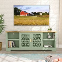 a living room scene with focus on the sideboard and barn in the back ground