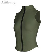 a women's green top with zippers on the sides and an open back