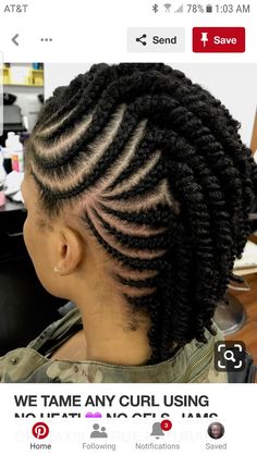 the back of a woman's head with cornrows and twists in it