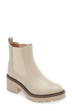 A classic Chelsea boot is remixed in this leather version that's boosted by a hardy lug platform and block heel. 2 1/2" heel; 1 1/4" platform (size 8.5) 5 1/2" shaft Pull-on style with elastic gore insets Water-resistant Leather upper/synthetic lining/rubber sole Imported Cream Leather Platform Boots For Fall, Chic Cream Boots With Lug Sole, Fall Cream Boots With Lug Sole, Beige Leather Platform Boots With Block Heel, Cream Leather Platform Boots, Cream Leather Ankle Platform Boots, Beige Leather Platform Boots With Chunky Platform, Cream Leather Boots With Lug Sole, Beige Leather Boots With Chunky Platform