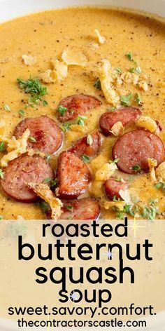 a bowl of roasted butternut squash soup with sausages and parsley on top