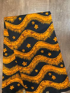 This  African Fabric is high quality African print made from 100% cotton and it's 45 inches wide. It is used for making African Clothing, African quilts, & For Home decoration. FYI: Print is Double sided. The listing is for 1, 6 yards and Headwrap Each piece of fabric measures:  36in by 45in for 1 yard 216in by 45in for 6 yards 70in by 22in for Head wrap If you purchase more than one yard, you will receive one continuous piece. *If you require more than what I have listed, feel free to send me e Brown Ankara Fabric With Batik Print, Traditional Batik Print Fabric, Traditional Ankara Fabric With Batik Print, Black Ankara Fabric With Batik Print, Traditional Brown Ankara Fabric, Traditional Black Fabric With Block Print, Traditional Black Block Print Fabric, Orange Ankara Fabric With Batik Print, Black Fabric With Traditional Patterns