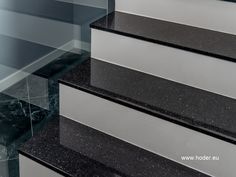 black and white marble stairs leading up to the top