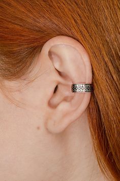 The Ear Cuff is made of Oxidised solid 925 Sterling Silver. Nickel free. It's very easy to wear! The cuff doesn't require piercing. Just put it on the smallest part of your ear and then move it to where it is most comfortable, queez slightly if necessary to have a stronger hold.  All our ear cuffs have oval shape that fit your ear shape better! Cartilage ear cuffs are suitable for almost 98% people. If you have never worn ear cuffs before and not sure about your ear shape, just send me a photo of your ear and I will help you to choose the most suitable jewelry. All our ear cuffs are adjustable. Please bend them slightly to perfectly fit the shape of your ear. An ear cuff should "embrace" your ear, but do not squeeze or hurt. You can wear it either on left or right ear, or even order a pair Ear Cuff Men, Double Pierced Earrings, Cartilage Ear Cuff, Elf Ear Cuff, Celtic Earrings, Multiple Ear Piercings, Ear Piercings Cartilage, Wrap Earrings, Cartilage Earring