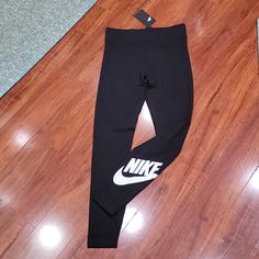 Nwt Size M Nike Knit Leggings. Style Is Tight Fit. Inseam Approx 28.5" Sporty Black Tights For Fall, Nike Full Length Casual Leggings, Nike Casual High-stretch Bottoms, Nike Fitted Activewear For Fall, Nike Fitted Bottoms For Streetwear, Nike Tight Sportswear Leggings, High Stretch Nike Black Leggings, Nike High Stretch Black Leggings, High Stretch Black Nike Leggings