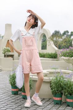 Pastel toned overalls with a roomy fit and embroidered flowers along the bib pocket, button up sides, side pockets and back pockets. S: 32" waist, 40" hips, 12" rise, 25" thighs, 6" inseamM: 33.5" waist, 41.5" hips, 12" rise, 26" thighs, 6" inseamL: 35" waist, 43" hips, 12" rise, 27" thighs, 6" inseam How to attach buckles:Slide the rectangular buckle on first, followed by the T-shaped buckle. Overall straps will hold on its own as such or you can slide the free end back into the rectangular buc Spring Utility Denim Jumpsuit With Side Pockets, Summer Overalls With Patch Pockets, Summer Bib Front Shortalls With Pockets, Utility Style Overalls With Bib Front And Suspenders, Utility Overalls With Suspenders And Bib Front, Utility Style Overalls With Suspenders And Bib Front, Utility Bib Front Overalls With Suspenders, Summer Shortalls With Side Pockets, Cotton Denim Bib Front Jumpsuit With Suspenders