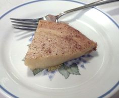 a piece of pie on a plate with a fork