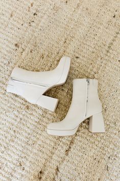 ulyses boots ivory leather // dolce vita – shop zoco White Platform Boots With Chunky Block Heel, White Ankle Platform Boots With Zipper, White Platform Boots With Zipper Closure For Spring, White Platform Ankle Boots With Zipper, White Ankle Platform Boots With Zipper Closure, White Chunky Platform Boots For Fall, Spring Beige Chunky Platform Boots, Beige Chunky Platform Boots For Spring, Chic Spring Platform Boots With Stacked Heel