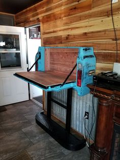 a kitchen area with a table and stove