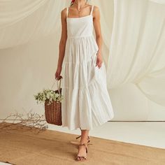 "Tiered linen dress with adjustable straps. - Handmade in my small studio from 100% pre-washed linen - Pinafore style neck and back - Adjustable shoulder straps - Hidden zipper closure on the side of the dress - Fitted top combined with a layered mid-calf length skirt. - Side pockets Fitting The model (height 5'9) is wearing a size S Length of dress is 50 inches ( Please mention the length if you need a different length) Garment measurements of the S laying flat (double to compare to body measur Beach Linen Dress, White Linen Dress Aesthetic, White Linen Slip Dress, Tiered Summer Dress, Long White Linen Dress, Spring Sun Dresses, Tiered Linen Dress, White Dress Linen, Tiered White Dress