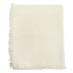 a white blanket with fringes on it