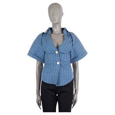 100% authentic Jacquemus Pape shirt in blue and grey plaid cotton (50%) and linen (50%). Features asymmetric two button front, a cinched waist and pleated V-neckline. Has been worn and is in excellent condition. 2017 Spring/Summer Les Santons De Provence Measurements Tag Size 34 Size XXS Shoulder Width 34cm (13.3in) Bust From 70cm (27.3in) Waist From 68cm (26.5in) Length 62cm (24.2in) Side Seam Length 31cm (12.1in) Sleeve Length 30cm (11.7in) All our listings include only the listed item unless otherwise specified in the description above Plaid Shirt Around Waist, Shirt Around Waist, Checked Blouse, Grey Plaid, Blue And Grey, Grey Cotton, Cinched Waist, Primavera Estate, Plaid Shirt