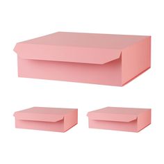 three pink boxes sitting on top of each other