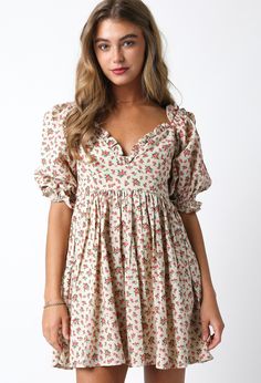 Elevate your style with our 'August Bloom Mini Dress'. This timeless dress features charming puff sleeves and a delicate ruffle hem, adding a touch of femininity to your look. The beautiful floral pattern adds a pop of color, making it the perfect choice for any occasion. Complete your wardrobe with this versatile and stylish mini dress. Content & Care: Self: 100% Linen Lining: 100% Rayon Hand wash cold Cottagecore V-neck Dress With Ruffles, Spring Puff Sleeve Mini Dress With Ruffles, Spring Brunch Puff Sleeve Dress With Ditsy Floral Print, Flowy Floral Print Puff Sleeve Dress For Garden Party, Flowy Puff Sleeve Floral Dress For Garden Party, Spring Prairie Dress With Gathered Sleeves For Garden Party, Feminine Floral Print Puff Sleeve Dress For Brunch, Spring Puff Sleeve Dress With Ruffle Hem, Flowy Puff Sleeve Dress With Floral Print For Daywear