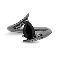 Embrace your unconventional spirit with this diamond and black onyx Maleficent ring. Wear this as a distinct statement piece to add an extraordinary edge to your fashion style and to show the world how you are authentically you. Let this wickedly elegant ring reveal your inner power and inspire you to pursue your unique purpose. Maleficent Ring, Enchanted Jewelry, Disney Fine Jewelry, Enchanted Disney Fine Jewelry, Black Rhodium, Elegant Ring, Pear Shaped Diamond, Maleficent, Size 10 Rings